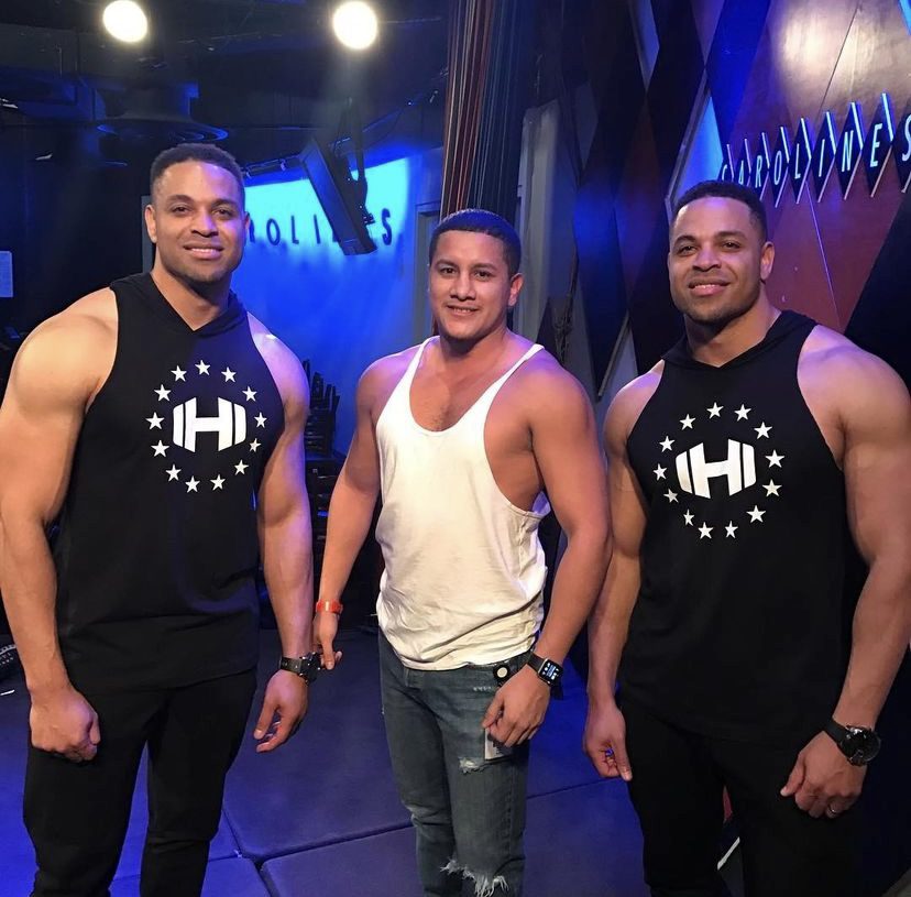 Mario Ortiz With Personal Training Clients NYC Gym Mario Ortiz posing with two personal training clients after a workout in a New York City gym.